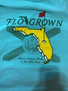 Men’s Flo Grown Hole State Tee. Size XL